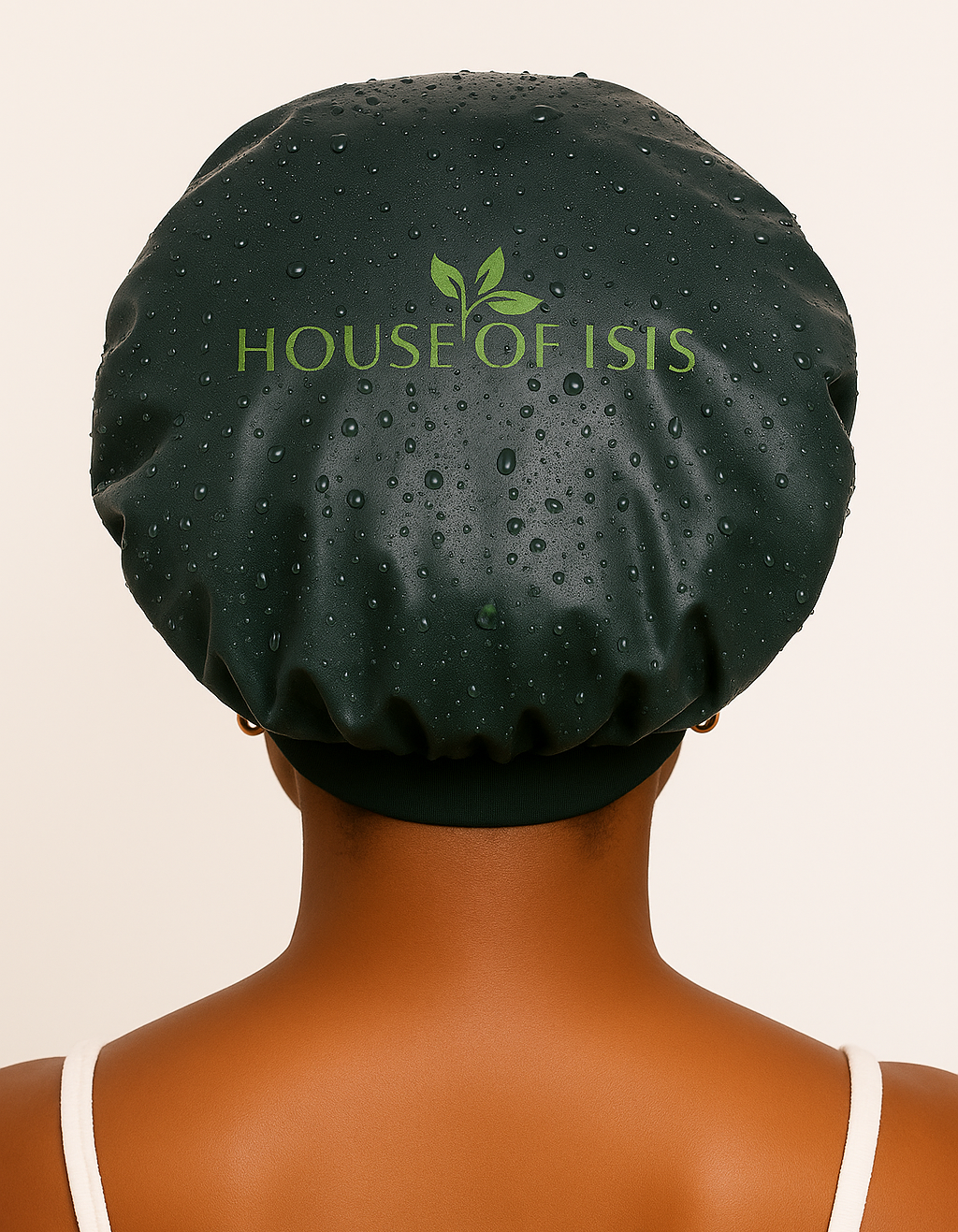 Person wearing a House of Isis extra-large 21-inch shower cap on a beige background